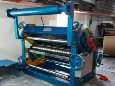 Corrugated box making machine